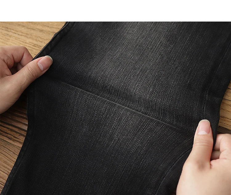 5028# 2024 Lente en herfst Nieuwe Amerikaanse retro elastische zwarte denim jeans Heren eenvoudige gewassen slanke rechte jeugd casual broek
