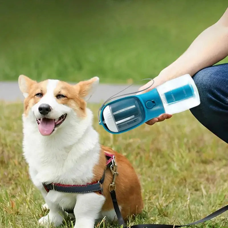 Three-In-One Portable Small Multi-functional Pet Water Bottle - With Water Drinking, Food, and Garbage Bag Compartments
