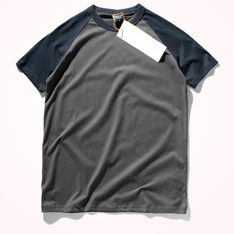 2023 Zomer Nieuw Raglanmouwen Tweekleurig Gestikt T-shirt Herenmode Korte mouwen Ronde hals 100% Katoen Casual Bottoming Top