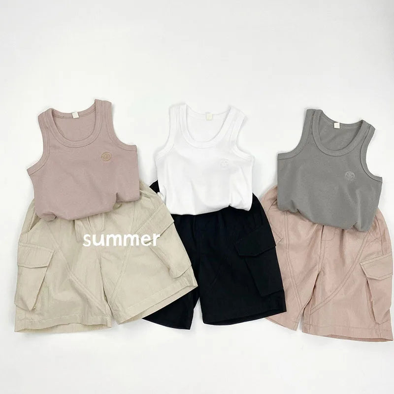 Zomer kinderoveralls schattige effen kleur zak jongens vijfkwart broek kinderen elastische taille meisjes werkkleding kort 1-6T unisex