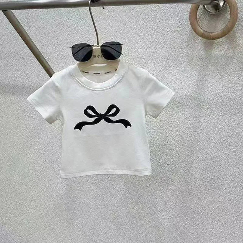 2-delige kinderkledingset voor de zomer met strik, kleurgeblokte top en effen jeans met rechte pijpen voor kinderen van 4-6 jaar.
