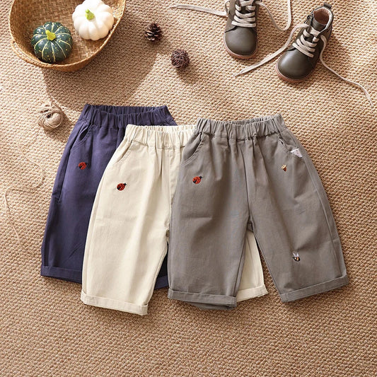 2025 Nieuwe baby kinder casual broek lente jongens effen kleur broek meisjes cartoon borduurwerk outdoor broek 1-5 jaar unisex