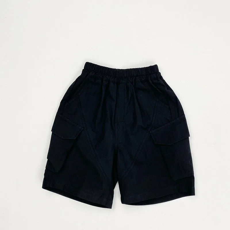 Zomer kinderoveralls schattige effen kleur zak jongens vijfkwart broek kinderen elastische taille meisjes werkkleding kort 1-6T unisex