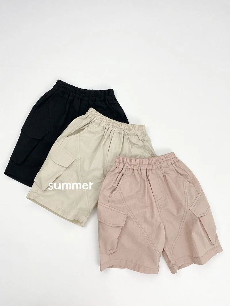 Zomer kinderoveralls schattige effen kleur zak jongens vijfkwart broek kinderen elastische taille meisjes werkkleding kort 1-6T unisex