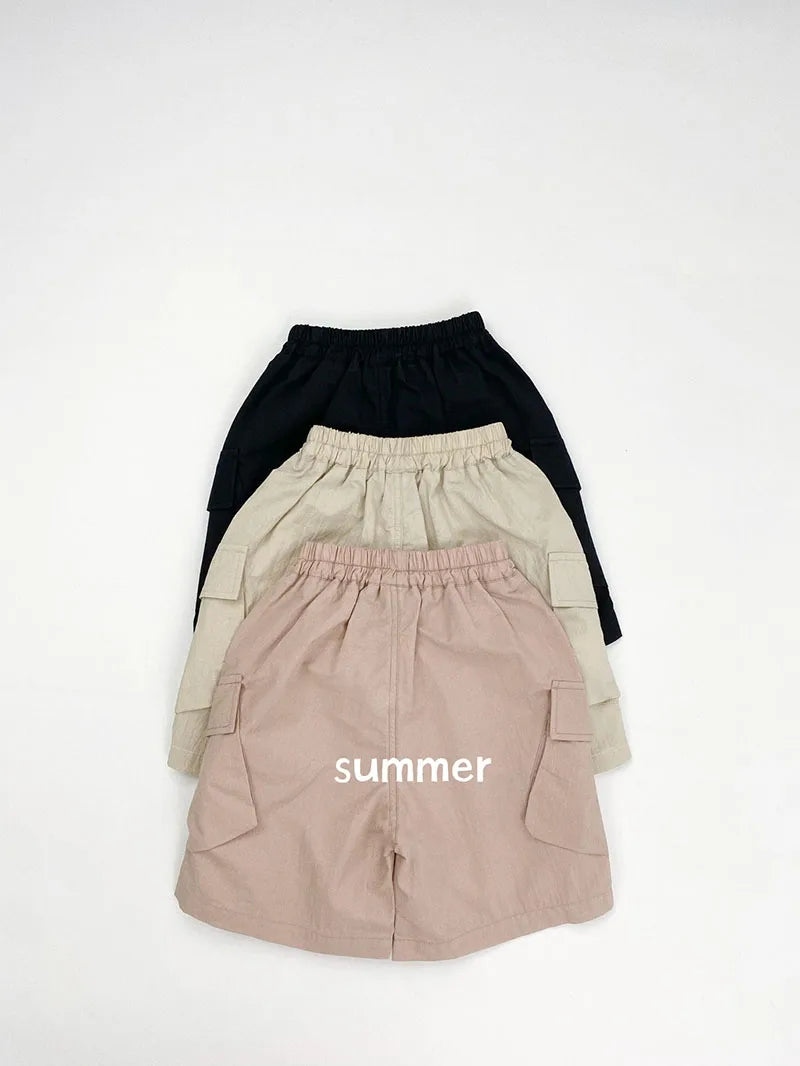 Zomer kinderoveralls schattige effen kleur zak jongens vijfkwart broek kinderen elastische taille meisjes werkkleding kort 1-6T unisex