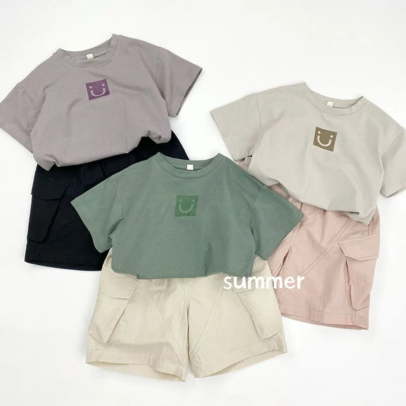 Zomer kinderoveralls schattige effen kleur zak jongens vijfkwart broek kinderen elastische taille meisjes werkkleding kort 1-6T unisex