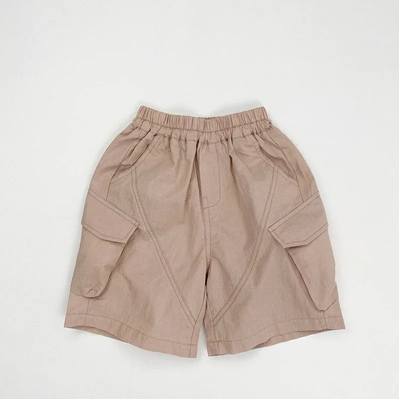 Zomer kinderoveralls schattige effen kleur zak jongens vijfkwart broek kinderen elastische taille meisjes werkkleding kort 1-6T unisex