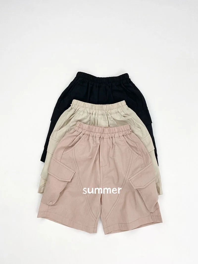 Zomer kinderoveralls schattige effen kleur zak jongens vijfkwart broek kinderen elastische taille meisjes werkkleding kort 1-6T unisex