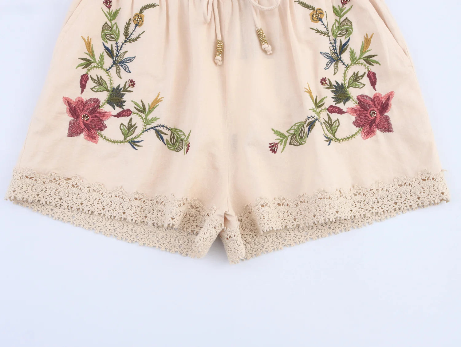 Casual shorts met bloemenborduursel voor dames, elastische tailleband en trekkoorden, polyester shorts voor de middelbare leeftijd, zomercollectie 2025