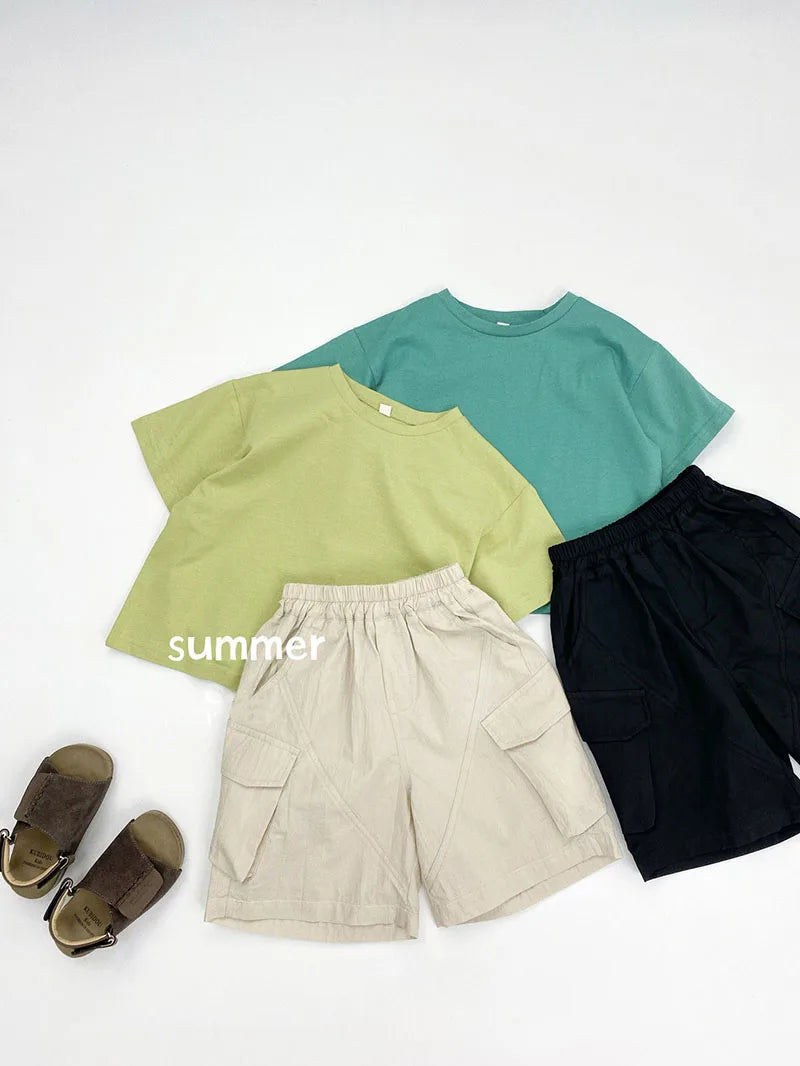 Zomer kinderoveralls schattige effen kleur zak jongens vijfkwart broek kinderen elastische taille meisjes werkkleding kort 1-6T unisex