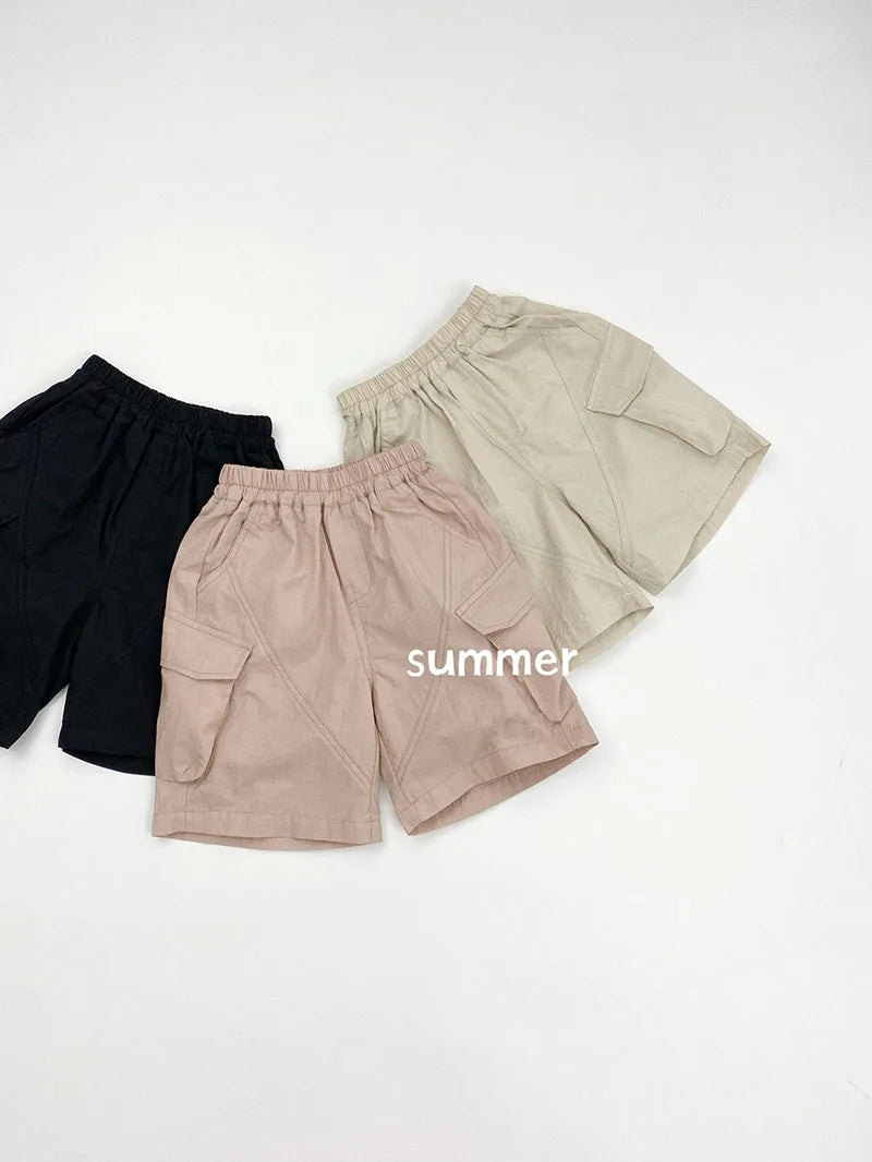 Zomer kinderoveralls schattige effen kleur zak jongens vijfkwart broek kinderen elastische taille meisjes werkkleding kort 1-6T unisex