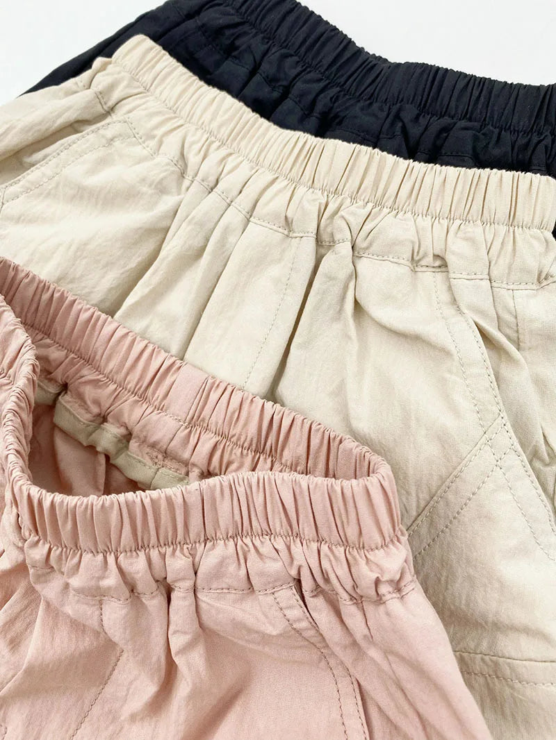 Zomer kinderoveralls schattige effen kleur zak jongens vijfkwart broek kinderen elastische taille meisjes werkkleding kort 1-6T unisex