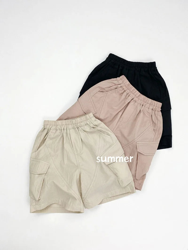 Zomer kinderoveralls schattige effen kleur zak jongens vijfkwart broek kinderen elastische taille meisjes werkkleding kort 1-6T unisex