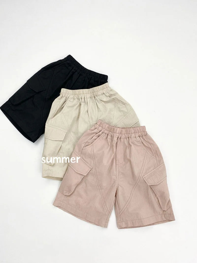 Zomer kinderoveralls schattige effen kleur zak jongens vijfkwart broek kinderen elastische taille meisjes werkkleding kort 1-6T unisex