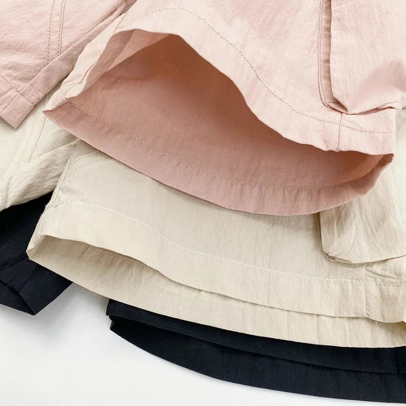 Zomer kinderoveralls schattige effen kleur zak jongens vijfkwart broek kinderen elastische taille meisjes werkkleding kort 1-6T unisex