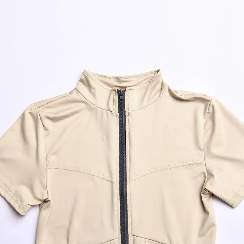 2025 Nieuwe dames jumpsuit effen kleur rits O-hals korte mouwen sport bodysuits dames zomer sexy slanke eendelige playsuits