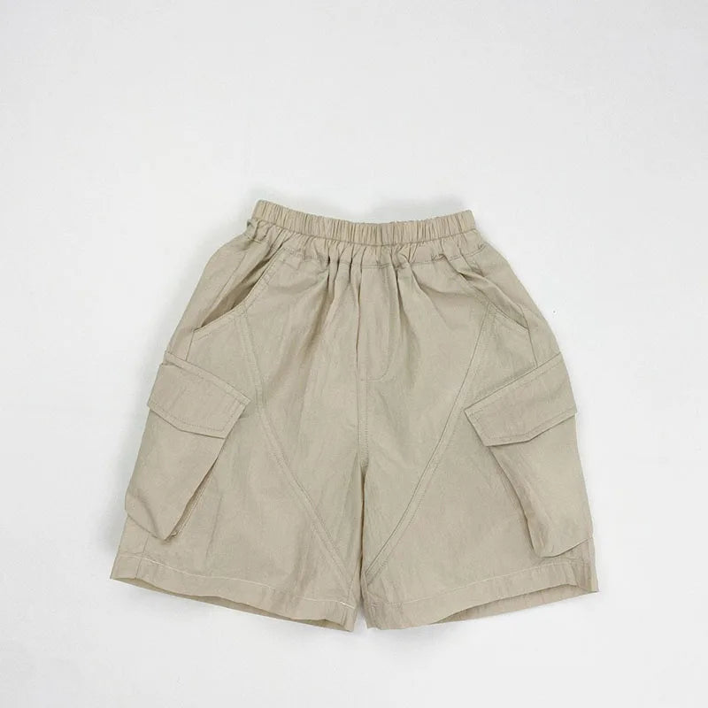 Zomer kinderoveralls schattige effen kleur zak jongens vijfkwart broek kinderen elastische taille meisjes werkkleding kort 1-6T unisex