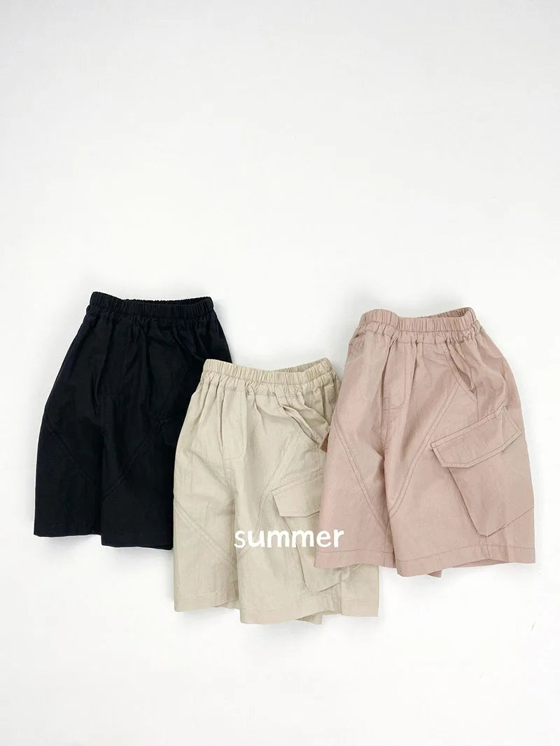 Zomer kinderoveralls schattige effen kleur zak jongens vijfkwart broek kinderen elastische taille meisjes werkkleding kort 1-6T unisex