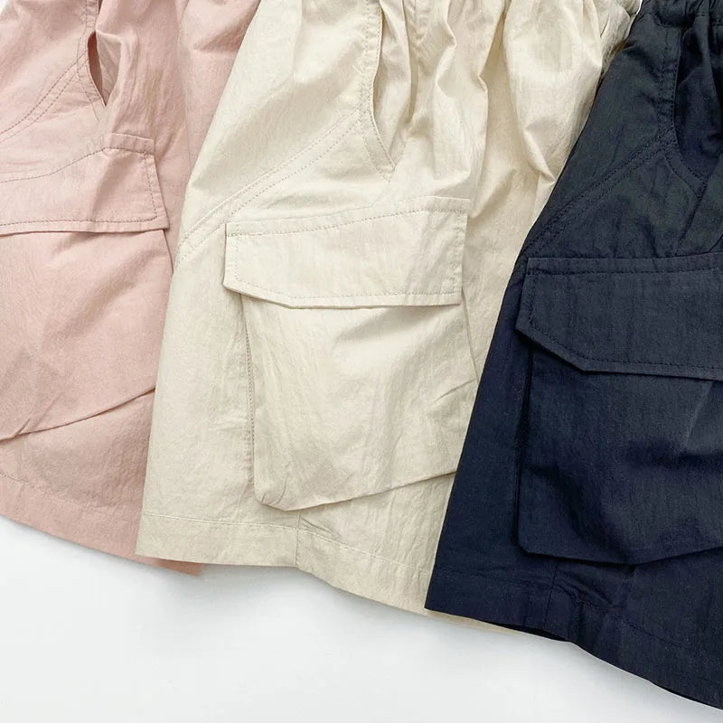Zomer kinderoveralls schattige effen kleur zak jongens vijfkwart broek kinderen elastische taille meisjes werkkleding kort 1-6T unisex