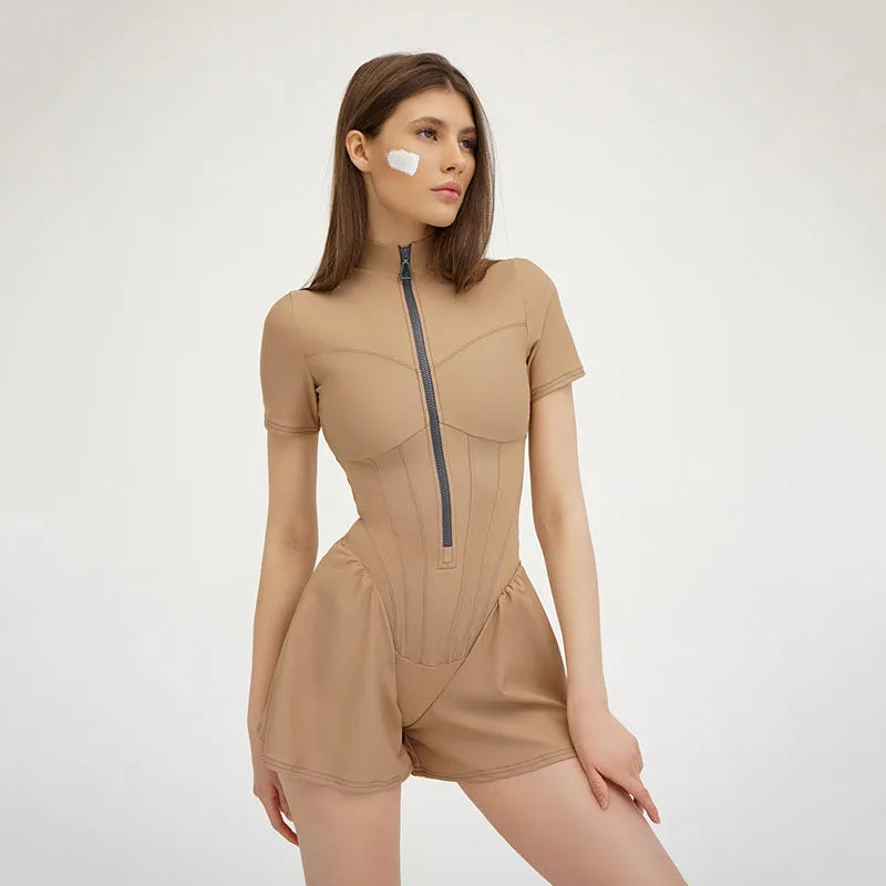 2025 Nieuwe dames jumpsuit effen kleur rits O-hals korte mouwen sport bodysuits dames zomer sexy slanke eendelige playsuits
