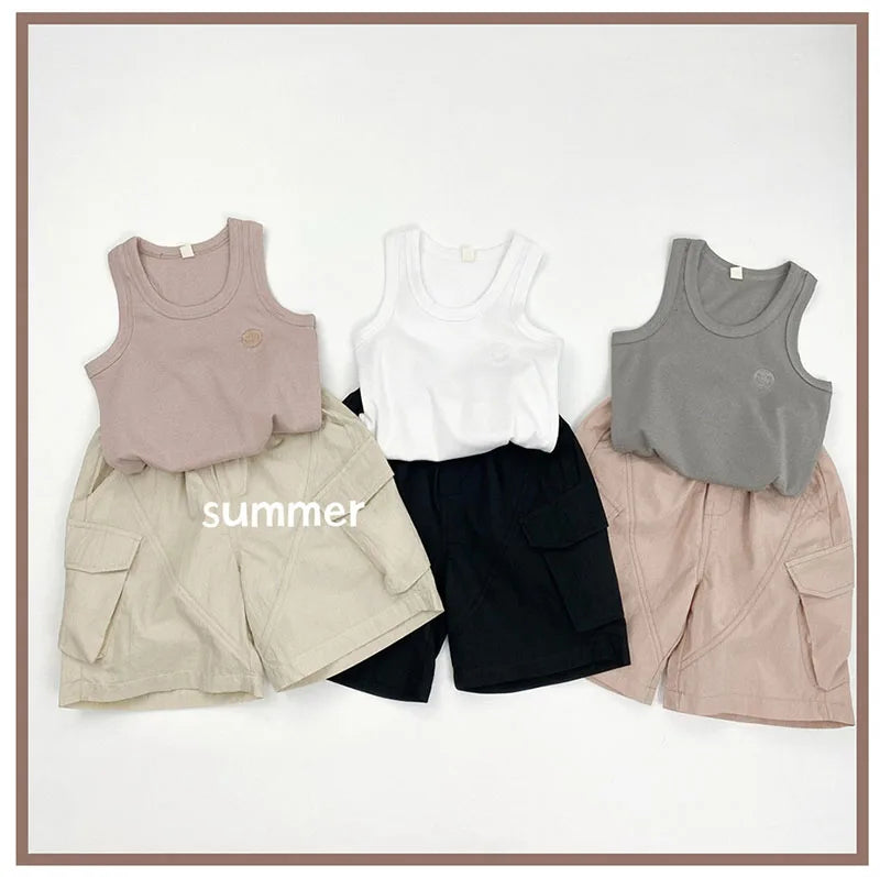 Zomer kinderoveralls schattige effen kleur zak jongens vijfkwart broek kinderen elastische taille meisjes werkkleding kort 1-6T unisex