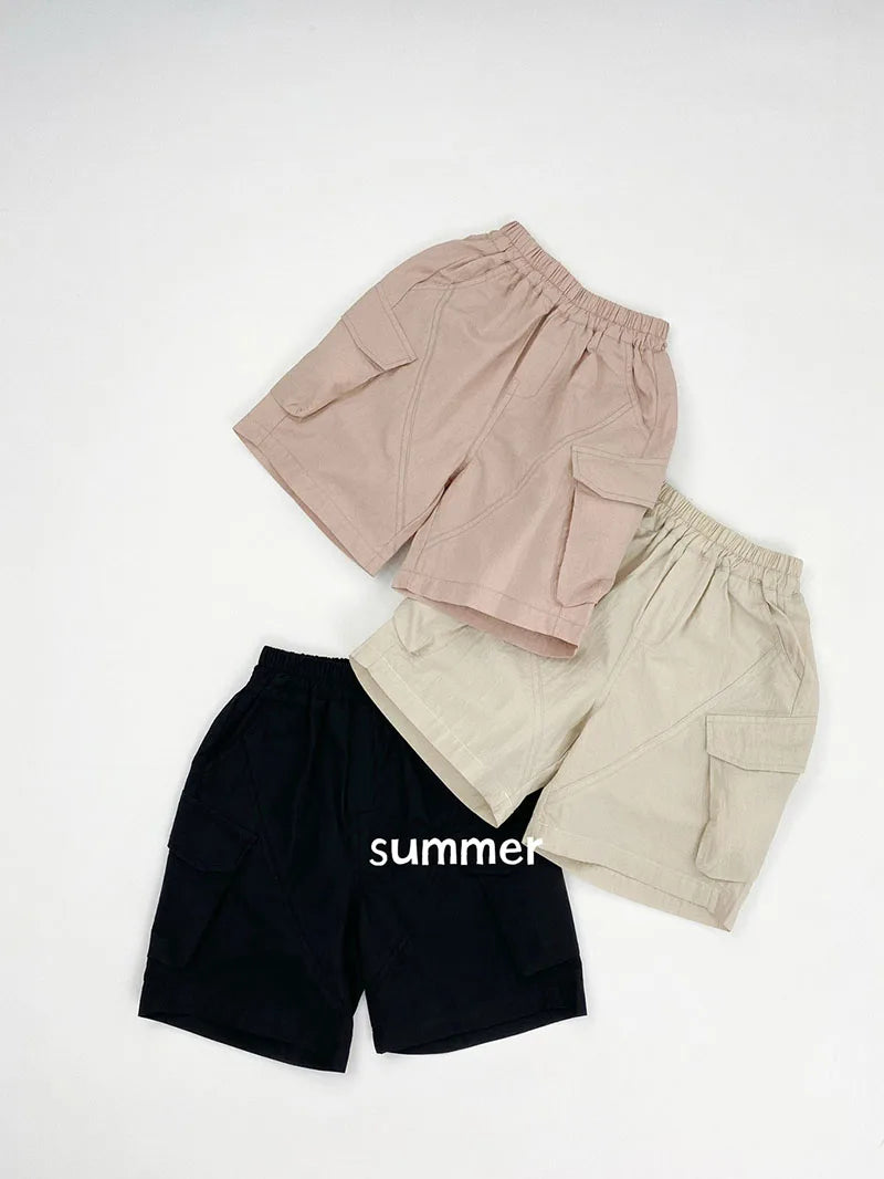 Zomer kinderoveralls schattige effen kleur zak jongens vijfkwart broek kinderen elastische taille meisjes werkkleding kort 1-6T unisex