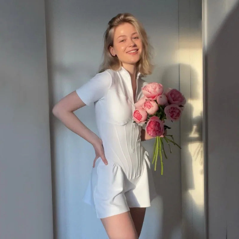 2025 Nieuwe dames jumpsuit effen kleur rits O-hals korte mouwen sport bodysuits dames zomer sexy slanke eendelige playsuits
