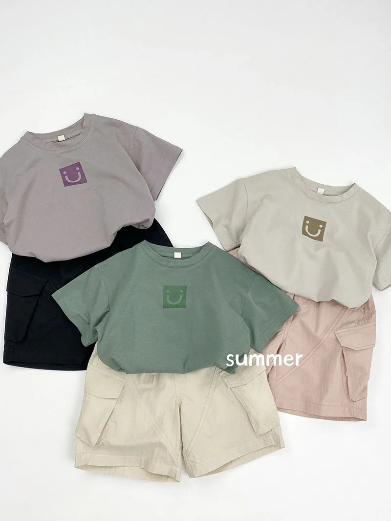 Zomer kinderoveralls schattige effen kleur zak jongens vijfkwart broek kinderen elastische taille meisjes werkkleding kort 1-6T unisex