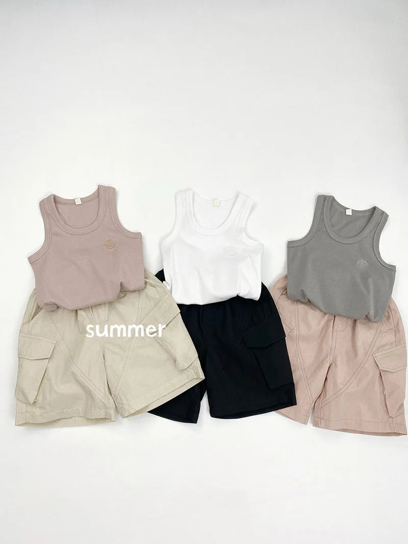 Zomer kinderoveralls schattige effen kleur zak jongens vijfkwart broek kinderen elastische taille meisjes werkkleding kort 1-6T unisex