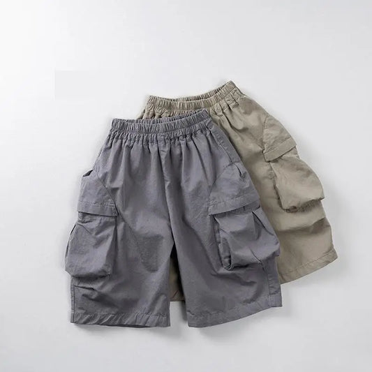 2025 Zomer Nieuwe Kinderen Casual Broek Katoen Jongens Veelzijdige Cargo Broek Effen Meisjes Dunne Losse Shorts Kinderen Outdoor Broeken 4-6Y Unisex